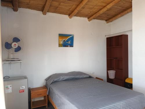 Ένα ή περισσότερα κρεβάτια σε δωμάτιο στο Bungalows Sol y Mar