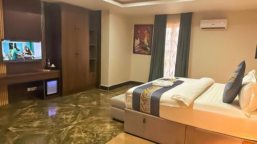 a hotel room with a floor covered in water at Tribu Hotels in Enugu