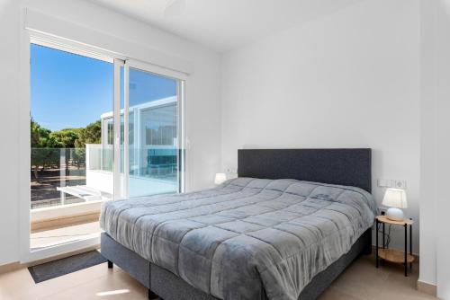 Ένα ή περισσότερα κρεβάτια σε δωμάτιο στο Casa Jorge