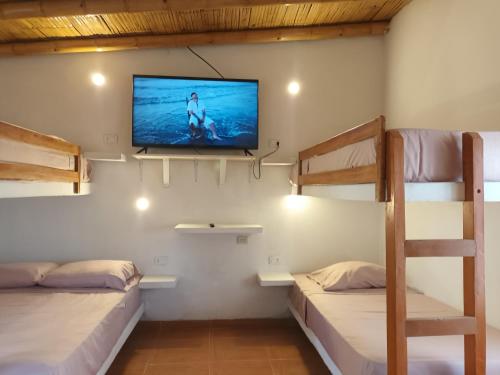 Ένα ή περισσότερα κρεβάτια σε δωμάτιο στο Bungalows Sol y Mar