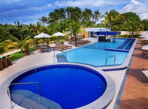Swimmingpoolen hos eller tæt på Guarajuba - Paraiso dos Coqueiros BA