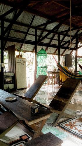 a plane sitting on the floor in a room at Viverde selva Redario natural in Alter do Chao