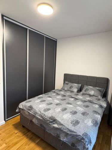 Postel nebo postele na pokoji v ubytování Apartman Konjic