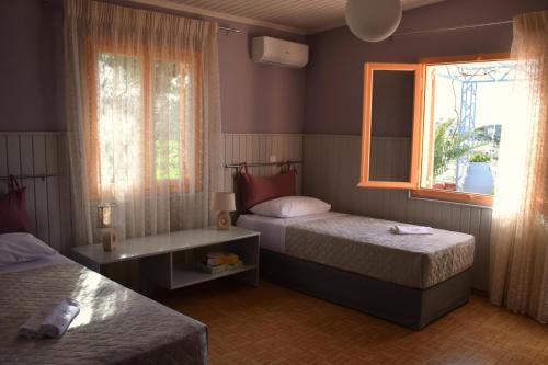 Katil atau katil-katil dalam bilik di Villa Theodosia