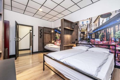 Postel nebo postele na pokoji v ubytování Vola Hostel