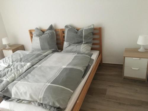Katil atau katil-katil dalam bilik di Ferienwohnungen Weiherhausstraße 6