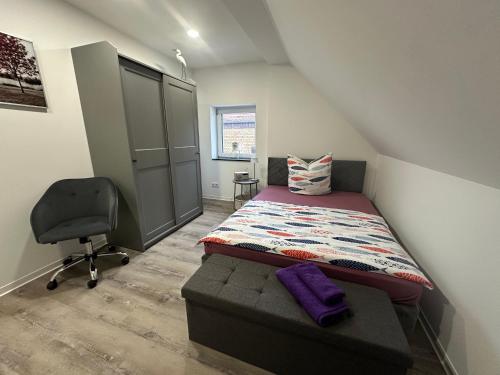 Ένα ή περισσότερα κρεβάτια σε δωμάτιο στο HT Appartement Nr 4