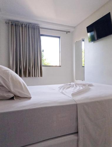 Una cama o camas en una habitación de Hotel Ceolatto Palace - Aeroporto