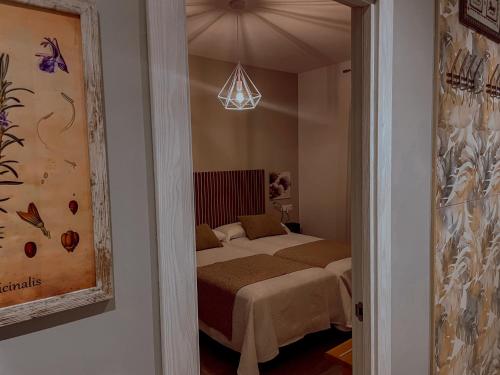 Postel nebo postele na pokoji v ubytování Casa Luna del Prado, Cerca de Puy Du Fou
