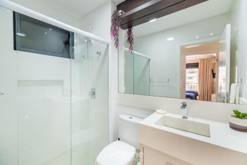 Et badeværelse på UML - Apartamentos quadra mar em Bombinhas