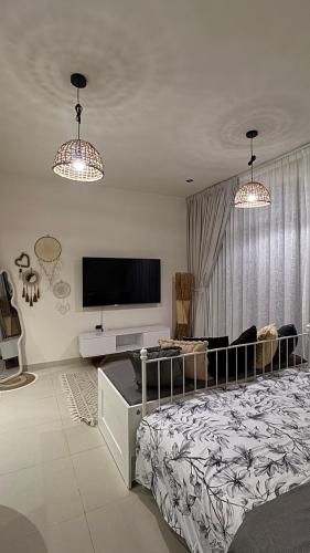 Postel nebo postele na pokoji v ubytování The Nest Elegant Residence Studio