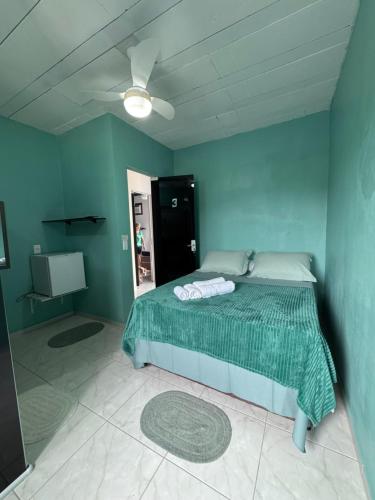 Postel nebo postele na pokoji v ubytování Suite 2 - Praia bonita hospedagem, agora com ar condicionado
