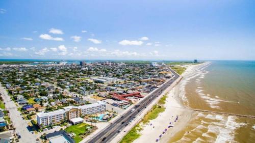 an aerial view of a beach and the ocean at Cozy Comfort 1BR - Renovated, Private, Pet Welcome in Texas City