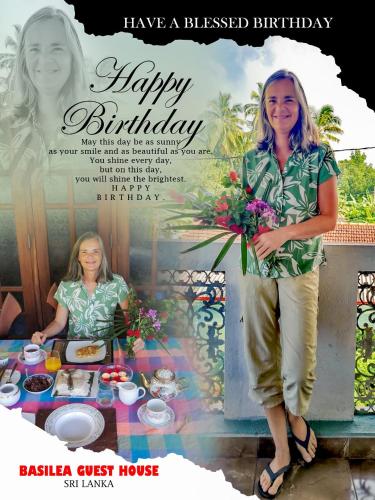 a woman standing next to a table with a happy birthday at Guest House Basilea in Beruwala