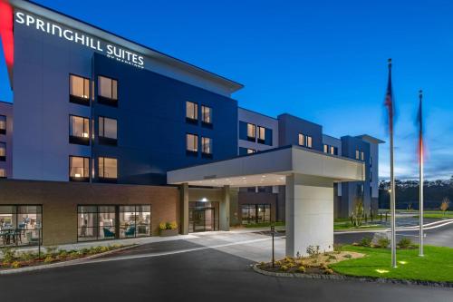a rendering of the front of a hotel at TownePlace Suites By Marriott Wrentham Plainville in Wrentham