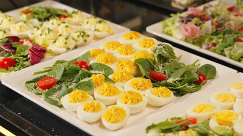 a tray of deviled eggs and salads on a table at Góralski Resort Pool & SPA in Białka Tatrzanska