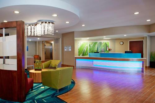 a lobby of a hotel with a waiting room at SpringHill Suites by Marriott Atlanta Six Flags in Lithia Springs
