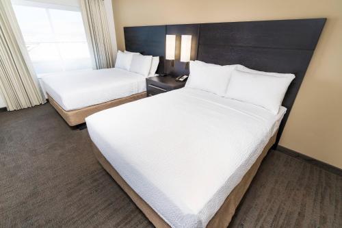 Кровать или кровати в номере Residence Inn by Marriott Reno Sparks