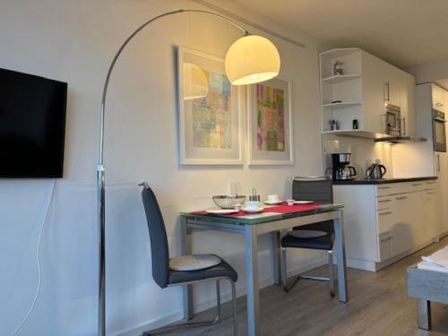 Una cocina o zona de cocina en Am Südwesthorizont App 185