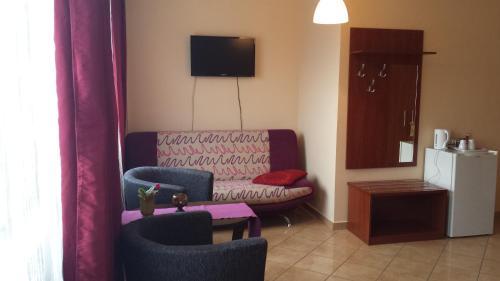 Posezení v ubytování Hotel Elda 2