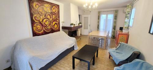 Χώρος καθιστικού στο Villa 5mn mer, 8pers, 100m2, grande terrasse, clim