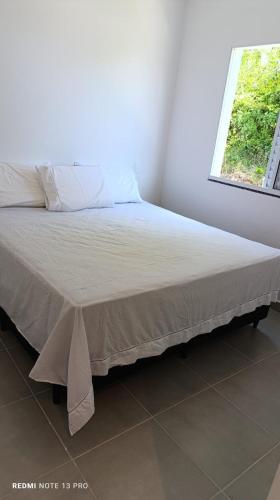 Postel nebo postele na pokoji v ubytování Terra Mater Residencial