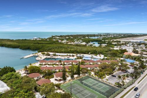 an aerial view of a resort with a tennis court at Florida Keys in Marathon