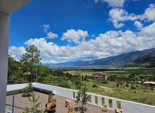 a view of the mountains from the balcony of a house at Casa De Campo Mirador H&L in San Antonio de las Alzanas