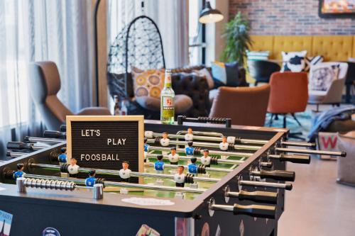 a lego chess set on display in a living room at Moxy Frankfurt Airport Kelsterbach in Kelsterbach