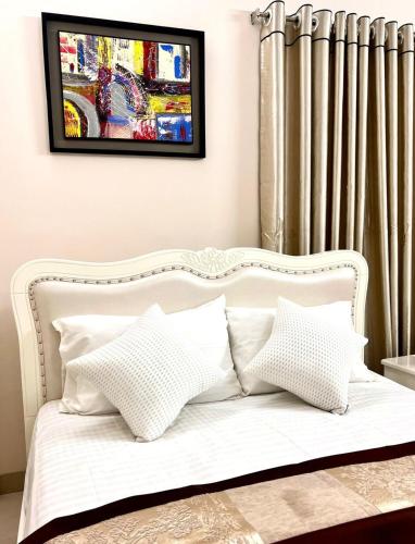 Katil atau katil-katil dalam bilik di Trips Trilogy Gulshan Apartmet