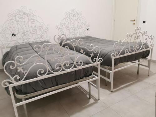Letto o letti in una camera di Meris affittacamere