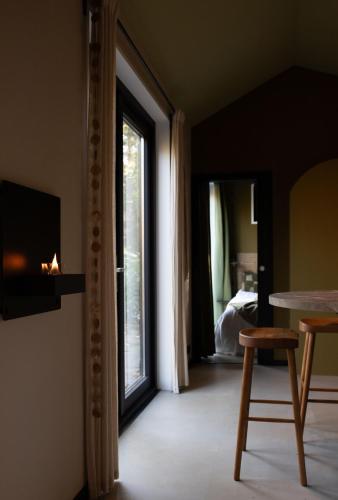 Μια τηλεόραση ή/και κέντρο ψυχαγωγίας στο Verde Tiny Lodge tinyhouse
