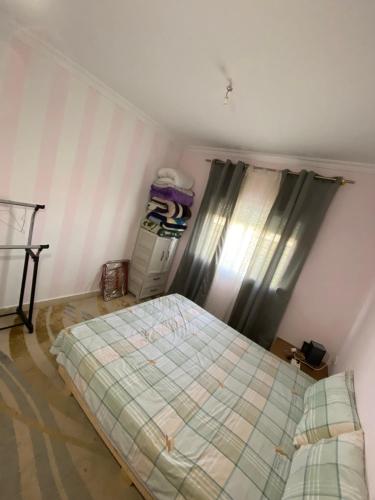 Postel nebo postele na pokoji v ubytování Appartement Tanger 1