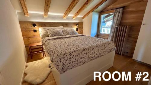 Postel nebo postele na pokoji v ubytování Appartement cosy avec vue