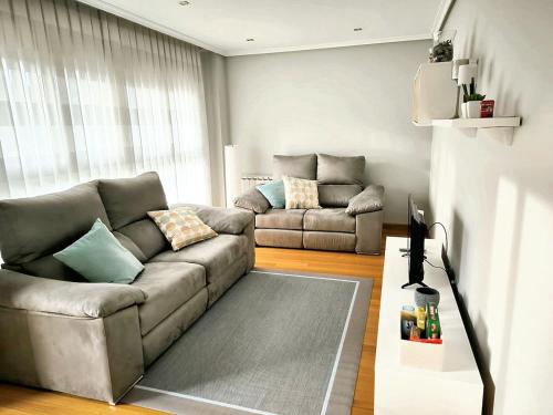 a living room with a couch and a table at Pedrosillo in Selaya