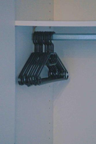a group of black racks hanging on a wall at Tulip apartment with your private entrance in Baunatal