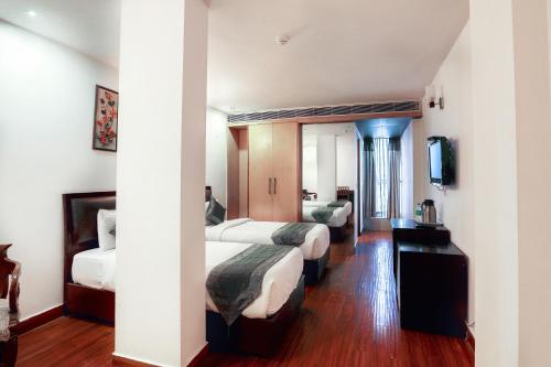 Postel nebo postele na pokoji v ubytování Airport Hotel Grand by Fantasia