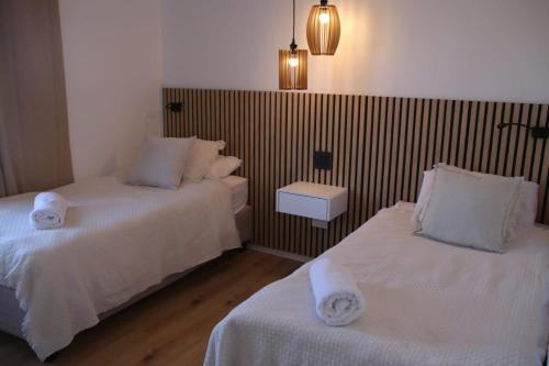 Ένα ή περισσότερα κρεβάτια σε δωμάτιο στο Sunset Lounge - Visit Langebaan