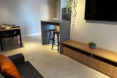 Et tv og/eller underholdning på Park Sul Ed. Essence - Estadia com ALMA