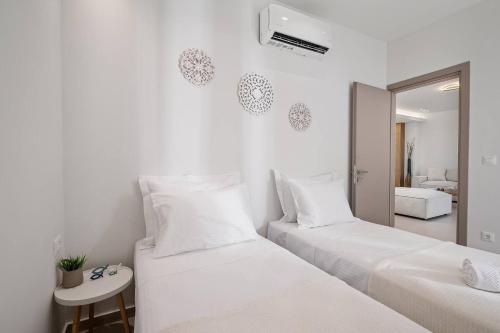 Ένα ή περισσότερα κρεβάτια σε δωμάτιο στο Renia Suite, Near The Sea