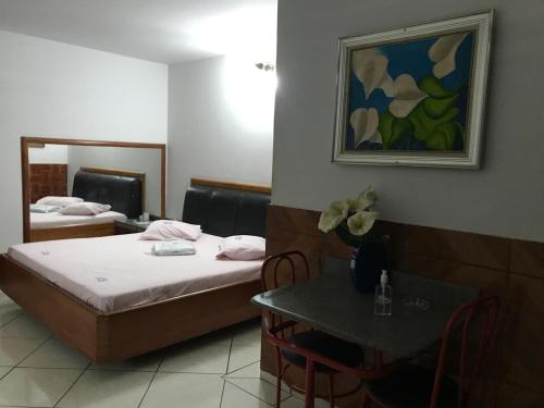 Postel nebo postele na pokoji v ubytování Onix Motel