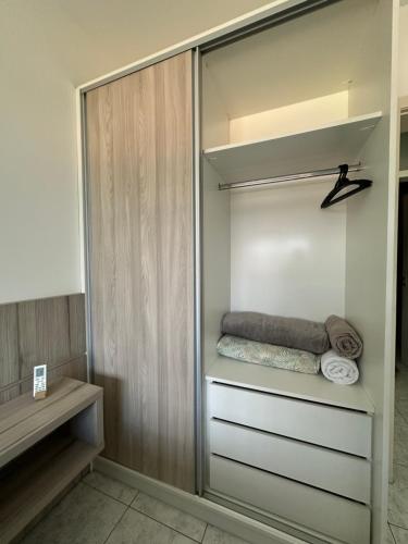 Katil atau katil-katil dalam bilik di Apartamento 1 dorm com garagem