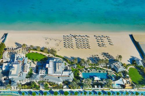 an aerial view of a resort on the beach at The St. Regis Abu Dhabi in Abu Dhabi