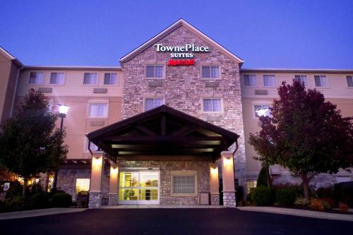 a front view of a hotel with a tower place suites at TownePlace Suites Joplin in Joplin