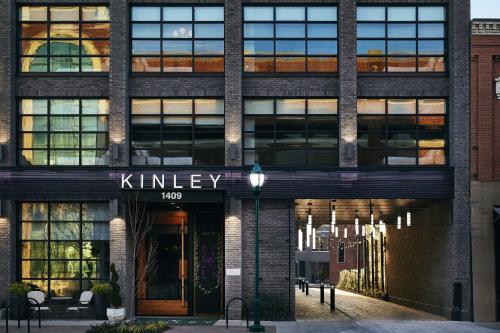a brick building with the entrance to kirkley at Kinley Chattanooga Southside, a Tribute Portfolio Hotel in Chattanooga