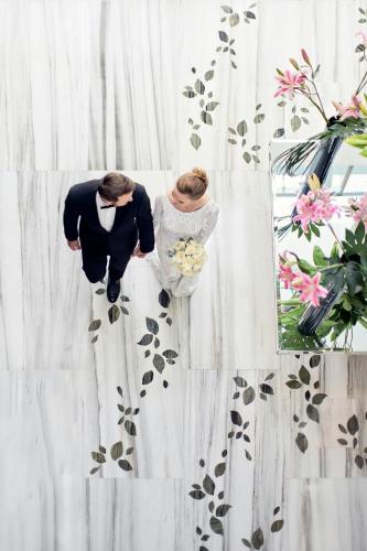 a woman is standing in front of a curtain at The St. Regis Mexico City in Mexico City