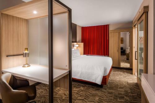 Ένα ή περισσότερα κρεβάτια σε δωμάτιο στο SpringHill Suites by Marriott Chambersburg
