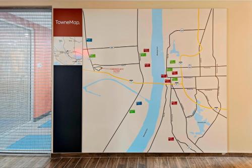 a wall mural in an office with a map at TownePlace Suites by Marriott Baton Rouge Port Allen in Port Allen