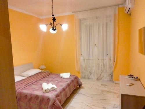 Postel nebo postele na pokoji v ubytování Casa di Anna