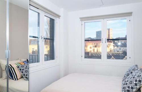 Ένα ή περισσότερα κρεβάτια σε δωμάτιο στο Apartment in Gamle Oslo